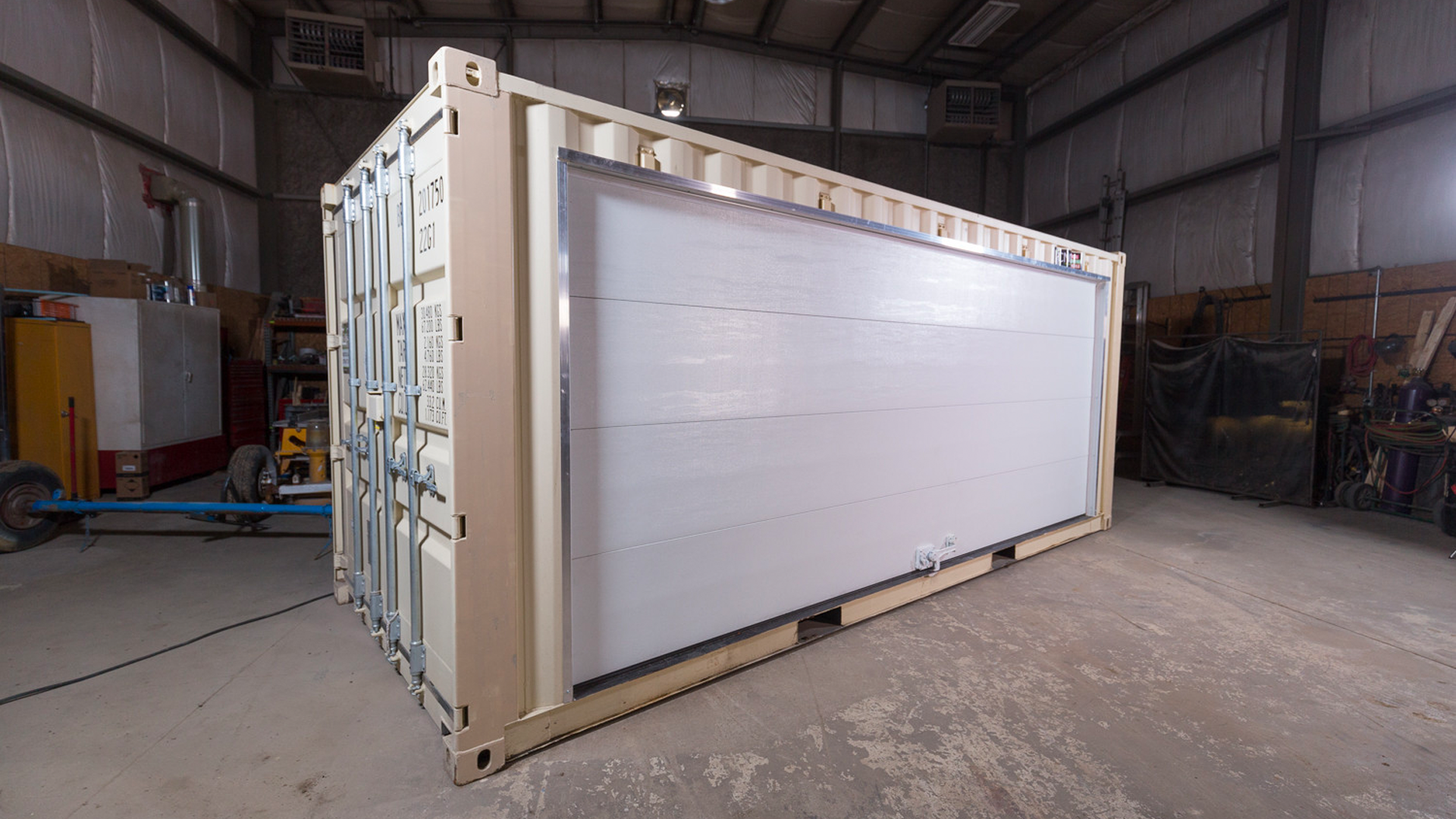 Exterior of container with one large garage door