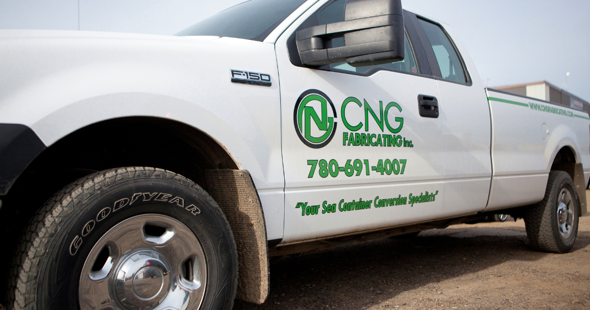 White Ford truck with CNG Fabricating logo on door