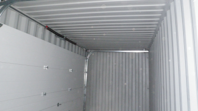 Interior of container with a close garage door