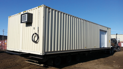 Side of container resting on trailer