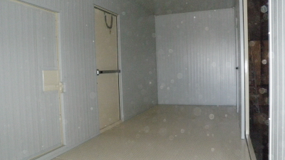 Inside of container looking at the inside of the doors