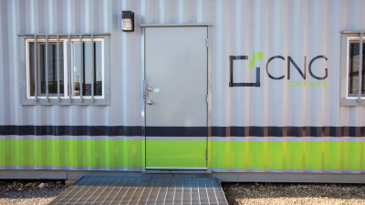 Close up of office containers door highlighting the CNG logo beside door