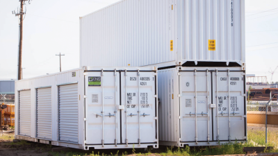 Exterior of three white containers with one stacked on another