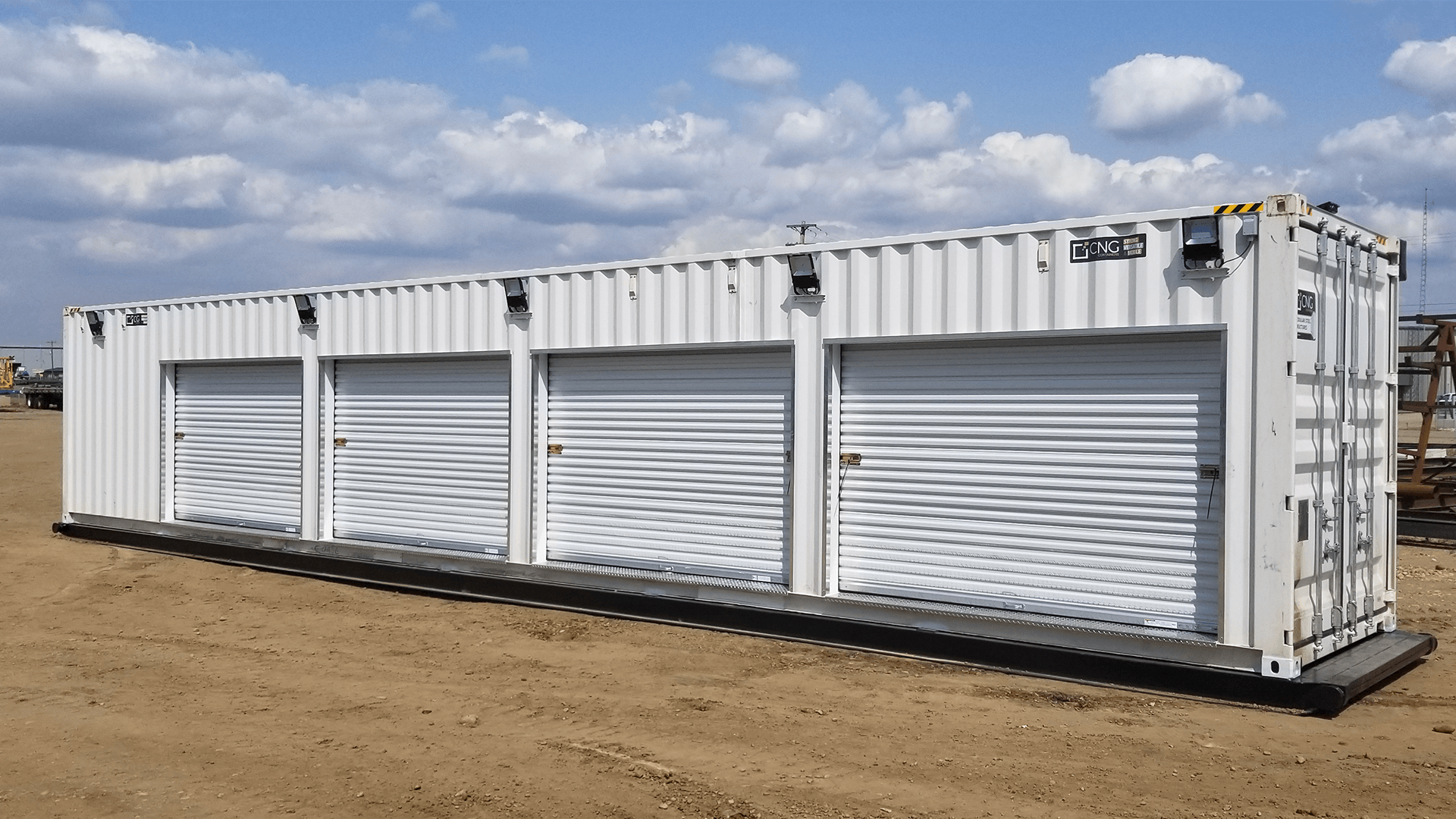 Exterior photo of a custom container with four garage style doors