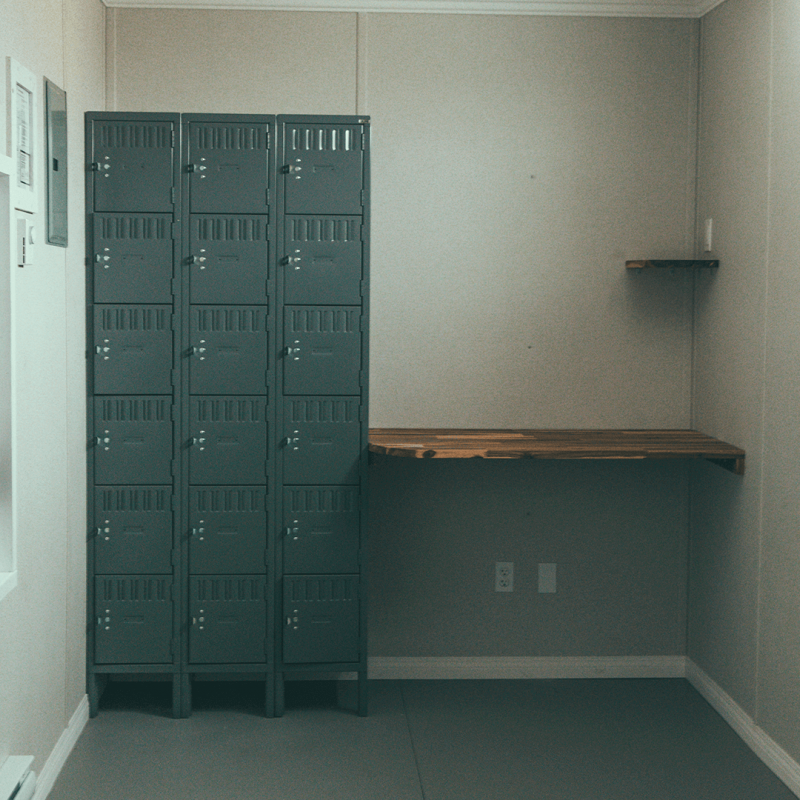 Shelf with locker beside inside lunchroom container