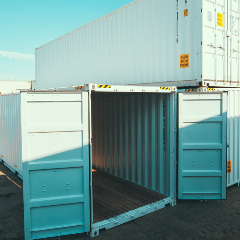 Stack of containers with one container with the doors open