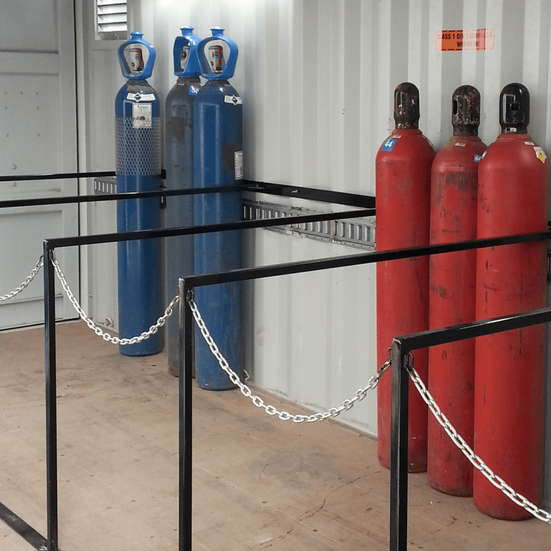 Gas cylinders lined up inside the container