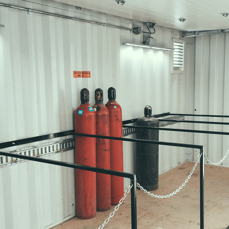 Gas cylinders inside of container