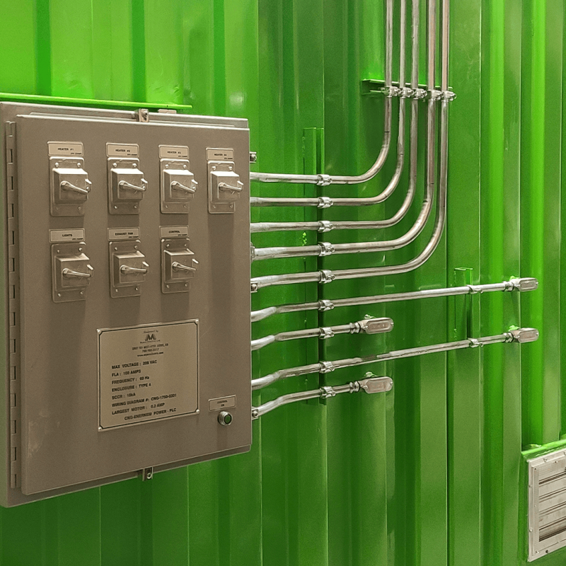 Close up of electrical panel on side of green container
